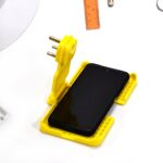 Multi-Purpose Wall Holder Stand for Charging Mobile, Just Fit in Socket and Hang (Mix Color / 1 pc) - Image 5